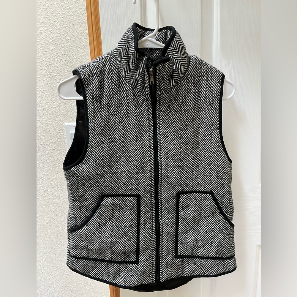 Black and white vest with zippers